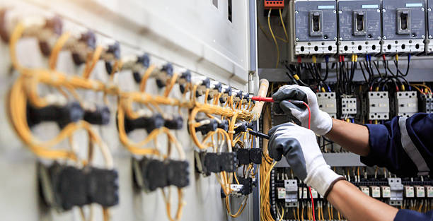 Professional Electrician technician working in Wollochet, WA